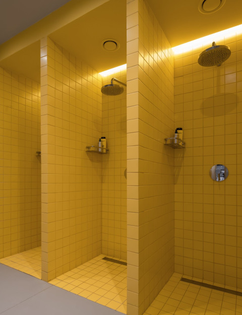 Detail of yellow sports fabric and functional design element at Act.now Sport Studio