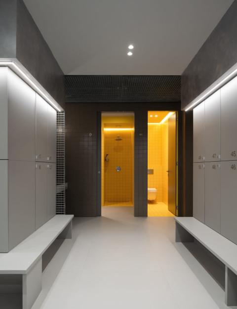 Yellow accent detail at Act.now Sport Studio