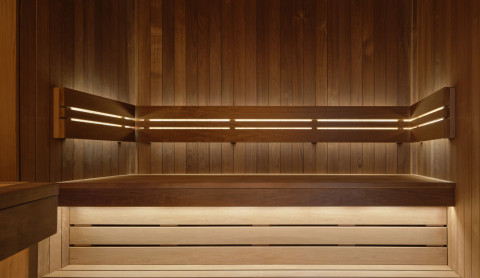 Large final view of the Gate-X Fitness Club interior with dramatic lighting and dark materials