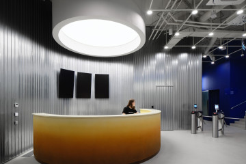 Futuristic reception and gym interior at Gate-X Fitness Club in Moscow
