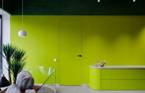 Habitat wall with layered structures and dark terrarium displays in Panteric