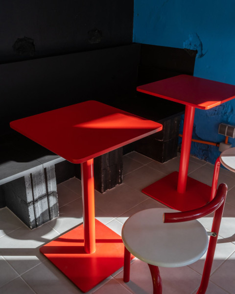 Service counter detail with colorful finishes inside TT-Eatery